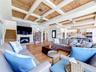 coffered ceilings enhance this family room area