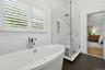 Walk-in shower and soaking tub, custom plantation shutters
