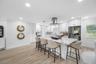 Open-Concept Kitchen with Quartz Island and Seating for Casual Dining