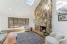 Living Room with Vaulted Ceiling and Fireplace - Photo 2