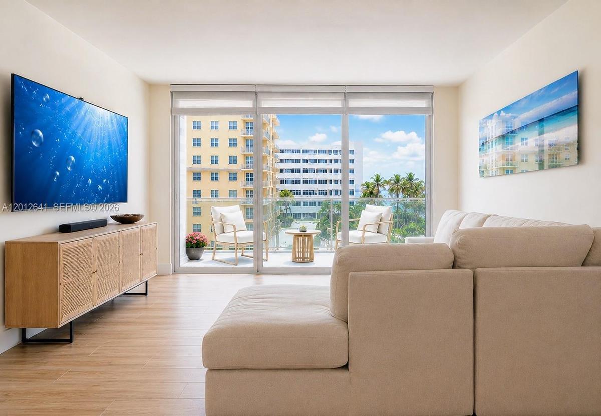SPACIOUS LIVING / DINING ROOM COMBINATION OFFERS CONTEMPORARY OPEN-FLOOR PLAN WITH EASY ACCESS OCEANSIDE TERRACE PERFECT FOR WARM BREEZES AND CONVERSA
