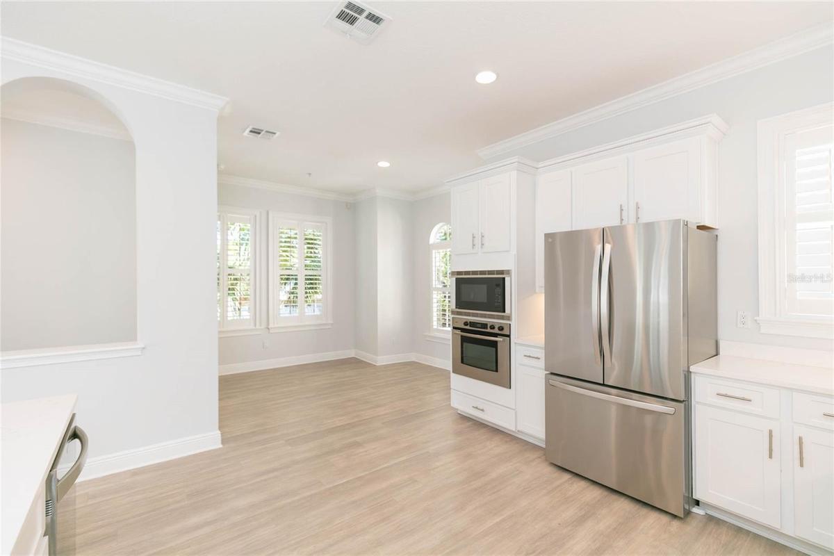 Breakfast nook adjoins kitchen
