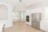 Breakfast nook adjoins kitchen
