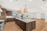 SEAMLESS OPEN-CONCEPT KITCHEN AND ENTERTAINING AREA