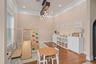 Original photo dining room space currently set up as playroom.