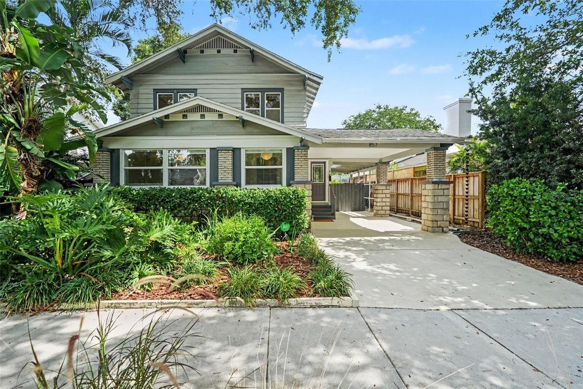 Set beneath a canopy of mature trees, this character-filled home blends historic charm with thoughtful modern updates.