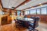 Office featuring beam ceiling, wood walls, recessed lighting, and a drop ceiling