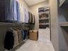 Virtually staged w/ clothing & hamper.
