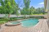 Virtually Staged Landscaping. Enjoy cooling off during these hot days in the saltwater pool and spa