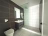 Full bathroom featuring vanity, walk in shower, light tile patterned floors, and tile walls