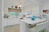 The Kitchen has an abundance of countertop space.