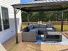 Wooden terrace with a gazebo