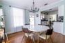 Dining area directly off kitchen and outdoor access to resort style pool!