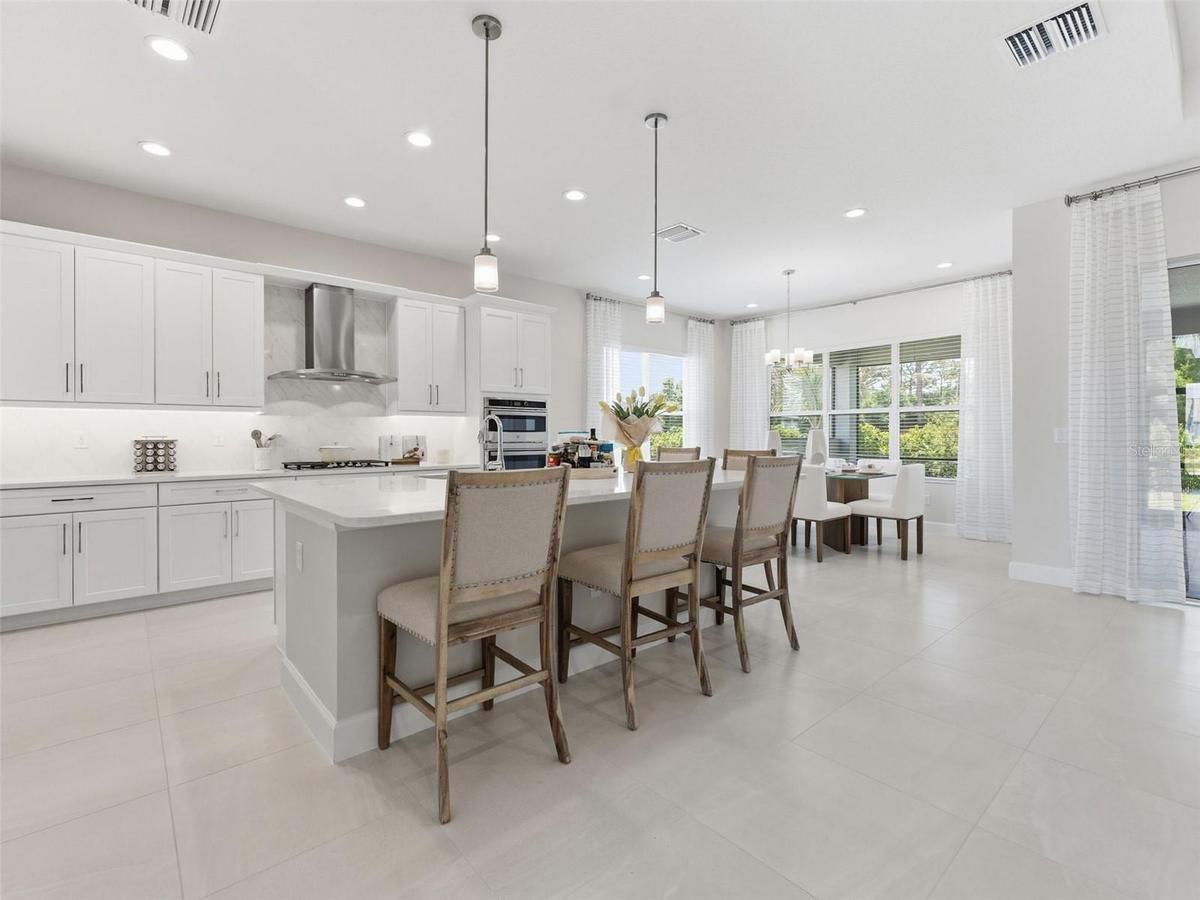 Recessed Lighting, Pendant Lights, Chimney Hood, Gas Cooktop  and More!