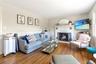 Living room featuring a fireplace and wood finished floors