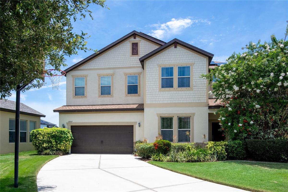 Brand New Roof May 2026, HVAC 2023, Solar Panels Paid Off, 4 Bedroom, 4 Baths, Upstairs Bonus Space and Large lanai with a Large Saltwater Pool,