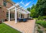 Patio Surrounded by Koi Pond with Waterfalls