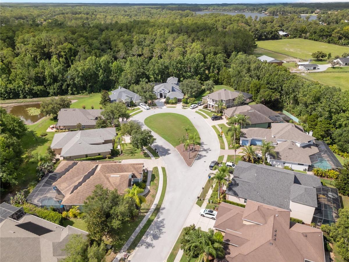 A quiet cul-de-sac setting offers limited traffic and a peaceful arrival home.