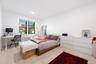 Primary bedroom includes walk-in closet and LED ceiling lights. Spacious enough for Furniture and at home office space