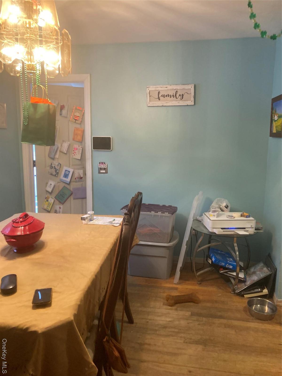 Dining room featuring wood finished floors