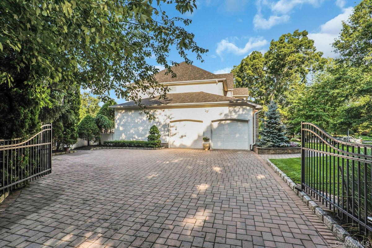 Gated Paver Driveway affords Luxury and Privacy.