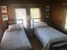 Bedroom with wooden walls