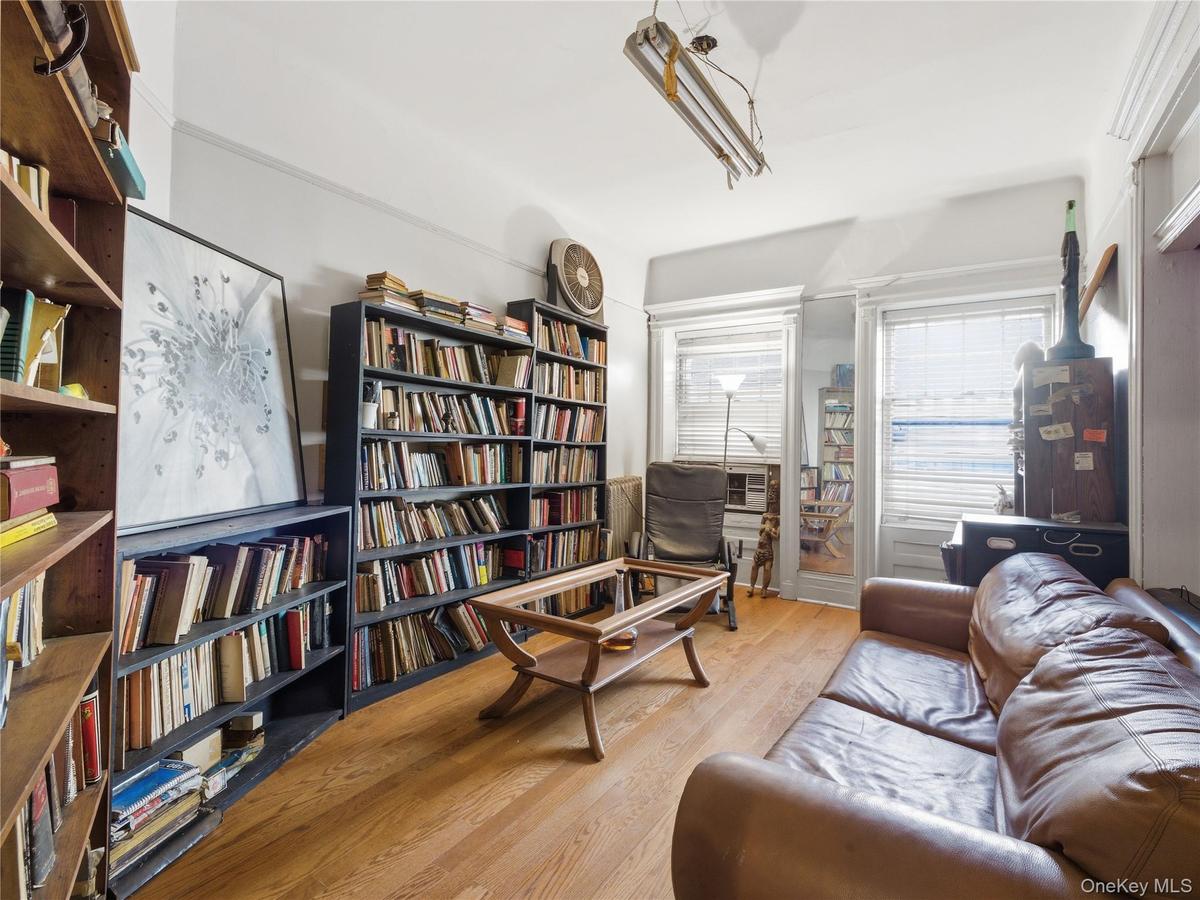 Sitting room featuring light wood-style flooring
