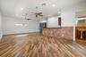 bonus room with 1/2 bath and wet bar.