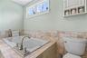 2nd floor full bath with soaking tub and shower