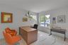 Spacious room with light gray walls and recessed lighting. Double Door Closet
