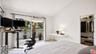 The spacious bedroom offers a