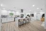 Open-Concept Kitchen with Quartz Island and Seating for Casual Dining
