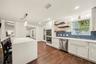 Gorgeous Kitchen with decorative blue tile backsplash & double Oven
