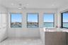 Open water view from the primary bathroom, oversized shower and tub