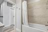 Top floor secondary bathroom with tub