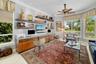 Study with custom designed cabinetry and quartize counter