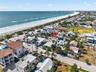 The Sea Loft and Corraline units, with the Cottage in the Front, steps to the beach and the park...exceptional location.