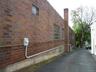 Side of building with new electrical service
