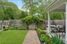 Fenced backyard with a gate