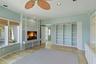 Library/Office with natural gas fireplace. Also perfect to convert to a ground floor Primary Suite.