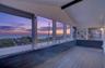 Sunset Hours on Oceanfront Balcony