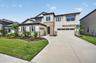 Stunning WestBay Belmar residence with sophisticated architectural details and impressive curb appeal