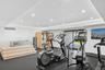 Exercise room featuring recessed lighting, plenty of natural light, and baseboards
