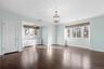 Large primary bedroom with 2 closets as well as a walk in closet and en suite bath.