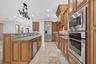 Wall oven, gas cooktop & spacious breakfast bar