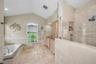 Primary bathroom w/separate soaking tub and shower