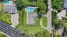 Aerial view of property's location featuring a pool area