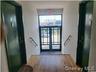 Foyer with wood finished floors