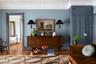 Living area featuring wood finished floors and ornamental molding