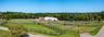 View towards the second largest barn and indoor ring.